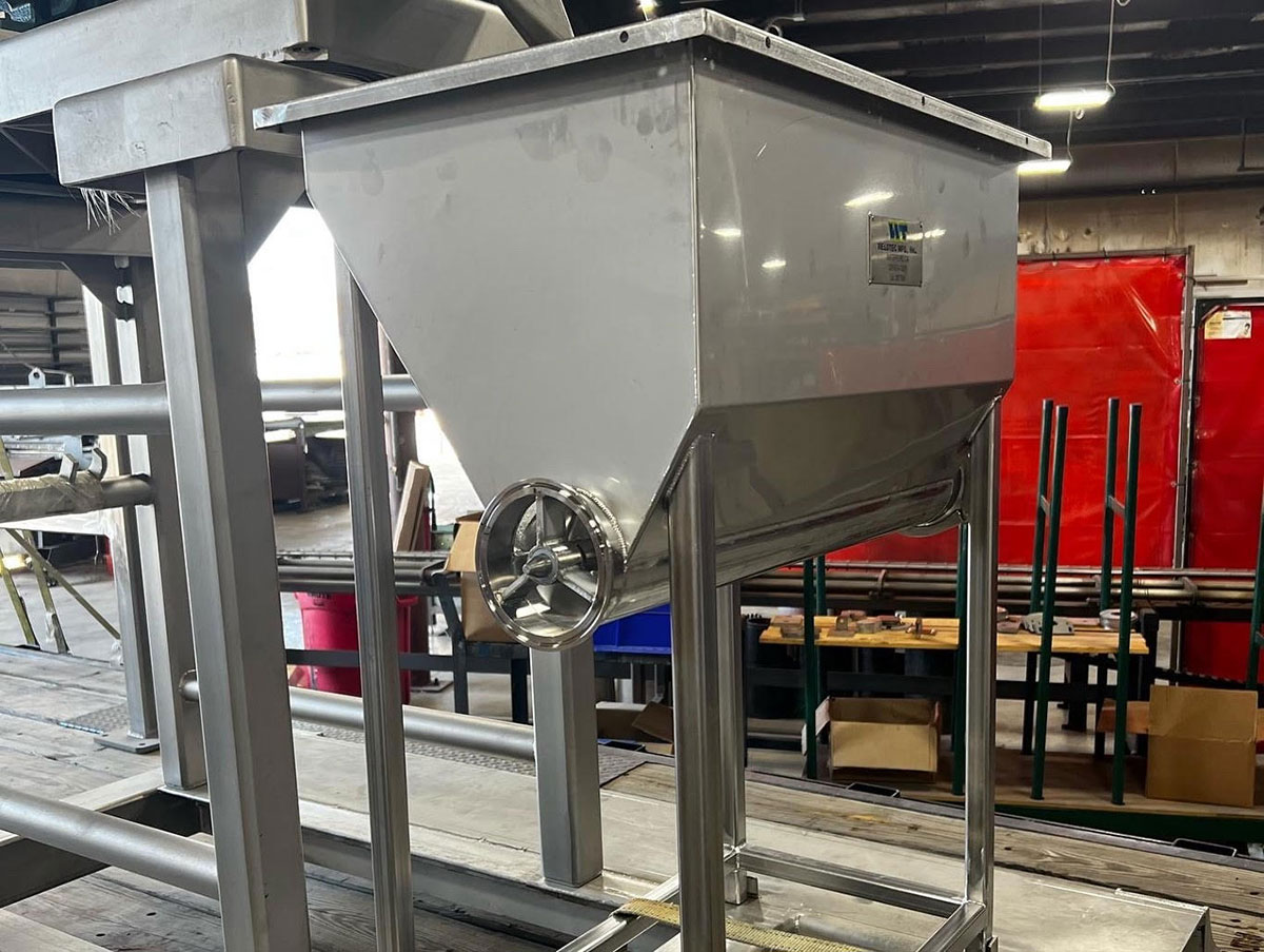 Stainless hopper fabricated and tagged by Weldtec