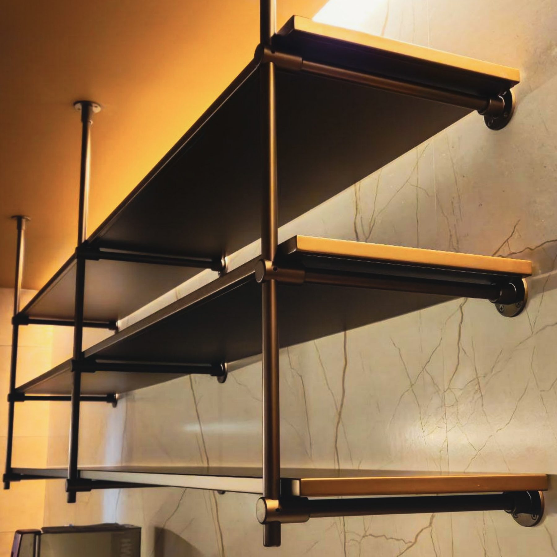 Anodized copper edges on floating shelves